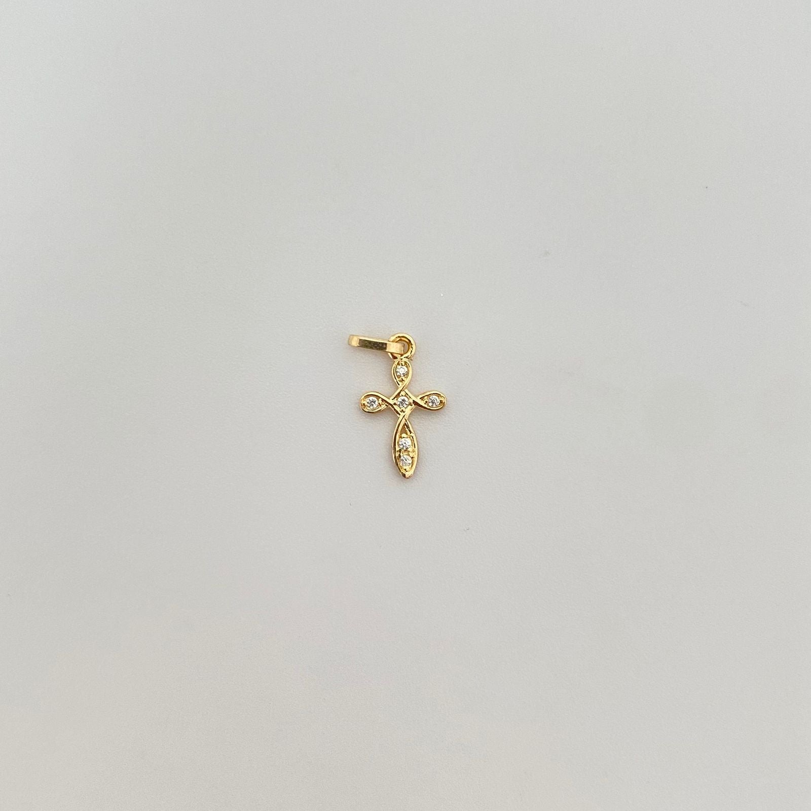 Dije mini cruz entrelazada circones Oro amarillo 18k 0,4 Gr / 1,6 Cm